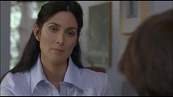 Carrie Anne Moss is fucked by guy who got tempted by her boobs ..